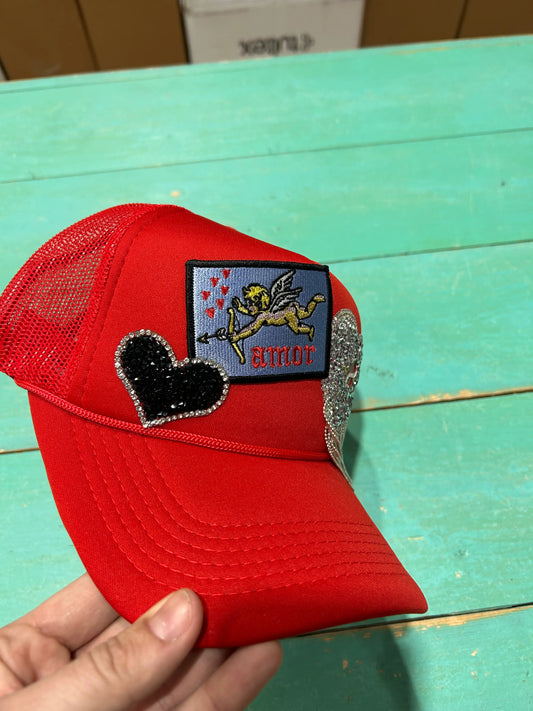 All things Amor Trucker Hat