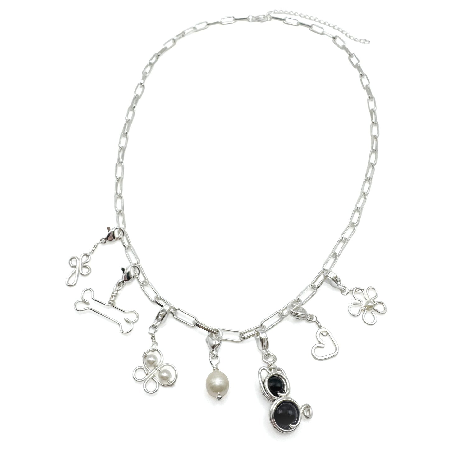 Bone silver charm